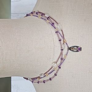 Purple Beaded and Sterling Silver pendant with Tourmaline and Amethyst stones.
